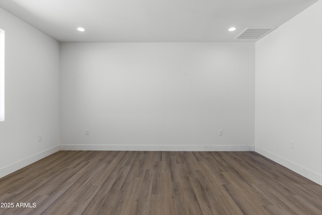 2689 S 305th Ave, Buckeye, AZ 85326 - spare room with wood finished floors, recessed lighting, and baseboards