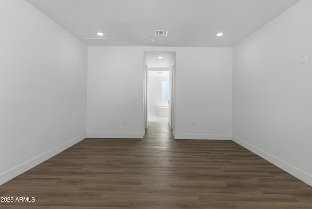 2689 S 305th Ave, Buckeye, AZ 85326 - spare room with recessed lighting, dark wood-style floors, and baseboards