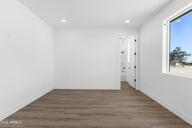2689 S 305th Ave, Buckeye, AZ 85326 - unfurnished room featuring recessed lighting, wood finished floors, and baseboards