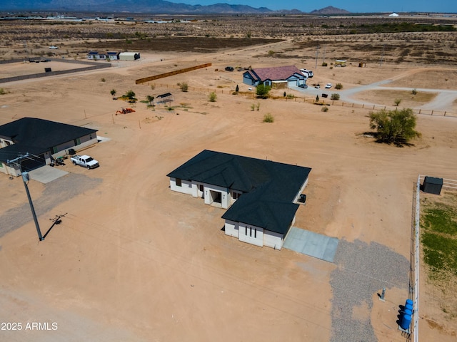 2689 S 305th Ave, Buckeye, AZ 85326 - aerial view of sparsely populated area with a desert landscape and a mountain backdrop