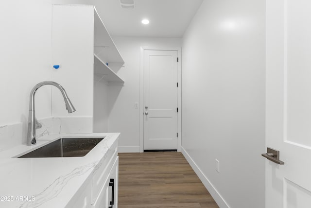 2689 S 305th Ave, Buckeye, AZ 85326 - laundry room with a sink, wood finished floors, baseboards, and recessed lighting