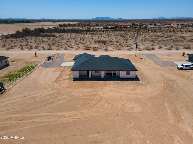 2689 S 305th Ave, Buckeye, AZ 85326 - aerial view of sparsely populated area with a desert landscape and a mountain backdrop