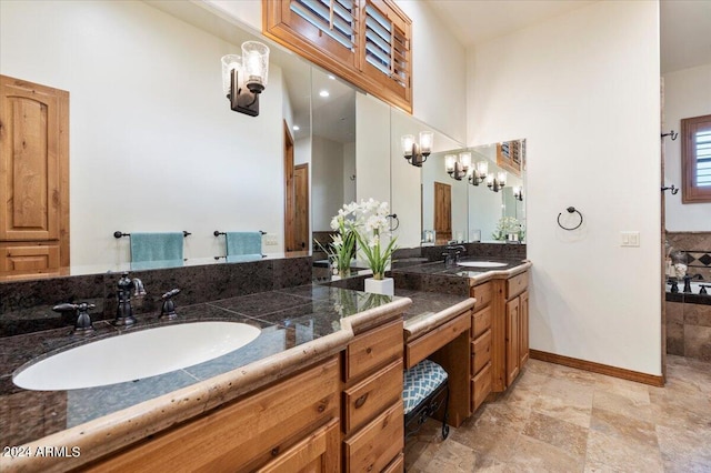 bathroom featuring tile patterned floors and dual bowl vanity