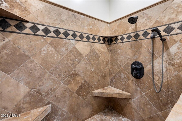 details with a tile shower