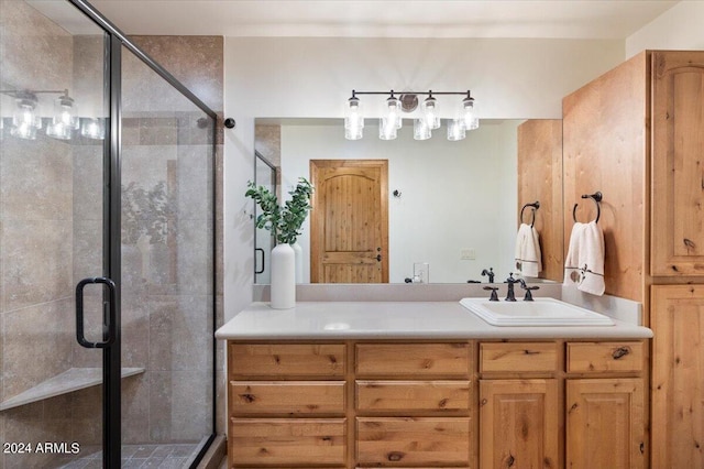 bathroom featuring vanity and walk in shower