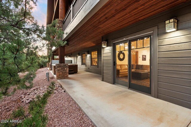 exterior space with a balcony and a patio area