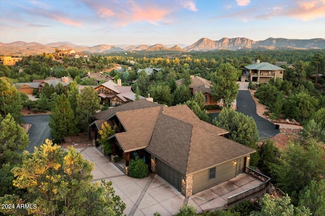 aerial view at dusk with a mountain view