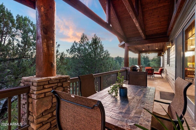 view of patio terrace at dusk