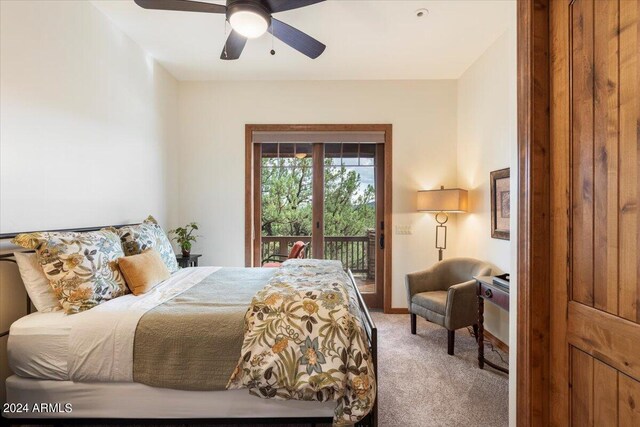 carpeted bedroom featuring ceiling fan and access to exterior