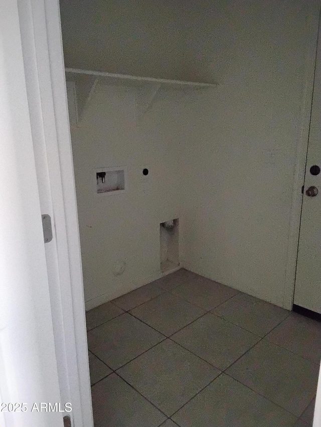 laundry room featuring hookup for an electric dryer, tile patterned floors, and washer hookup