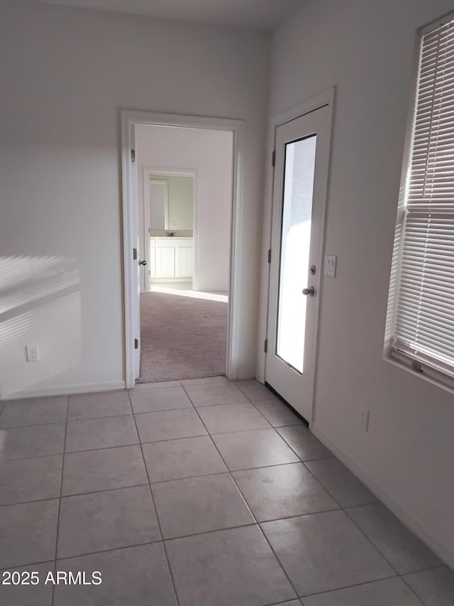 interior space with light tile patterned flooring