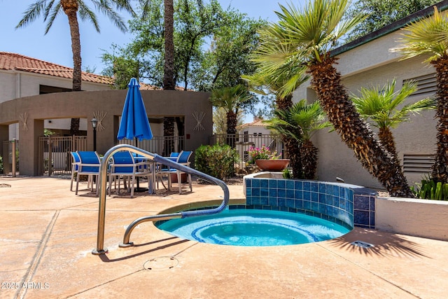 11375 E Sahuaro Dr Unit 1062, Scottsdale, AZ 85259 - view of pool with a community hot tub, a patio area, and fence