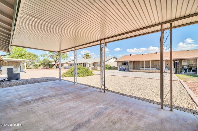 9639 W Cinnabar Ave Unit A, Peoria, AZ 85345 - view of patio / terrace with central air condition unit and a residential view