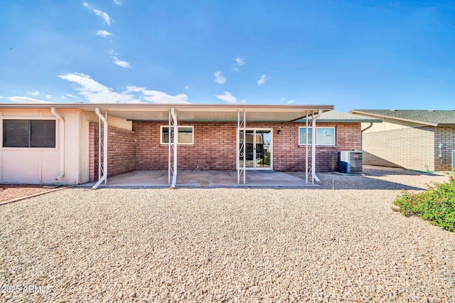 9639 W Cinnabar Ave Unit A, Peoria, AZ 85345 - rear view of house with cooling unit and a patio