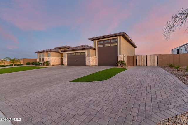 prairie-style home featuring a garage