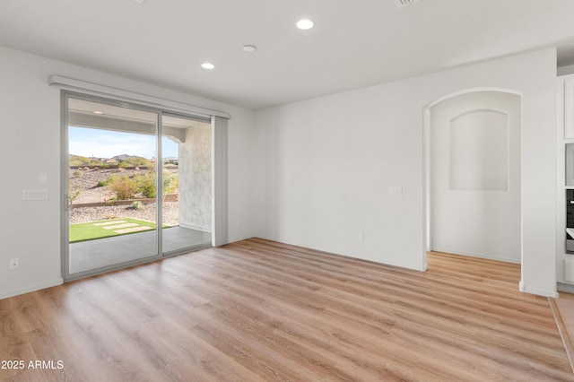 empty room featuring light hardwood / wood-style flooring