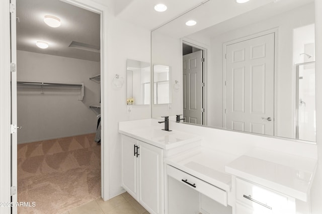 bathroom featuring vanity and tile patterned floors