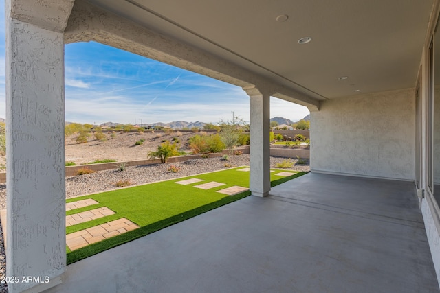 view of patio with a mountain view