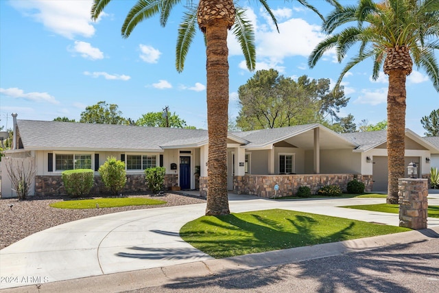 ranch-style house with a front yard