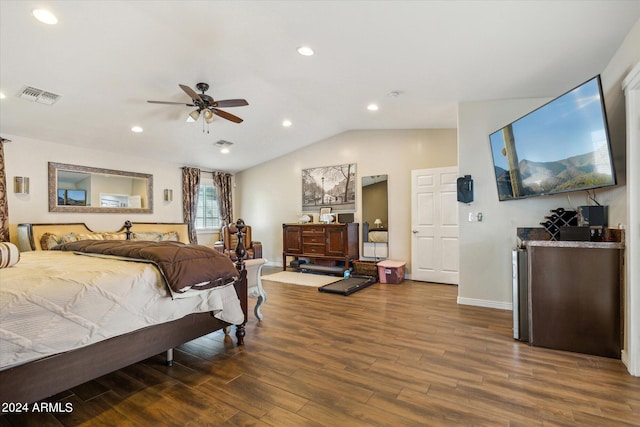 bedroom featuring ceiling fan, vaulted ceiling, and hardwood / wood-style floors