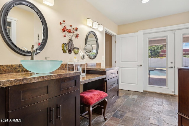 bathroom featuring vanity and french doors