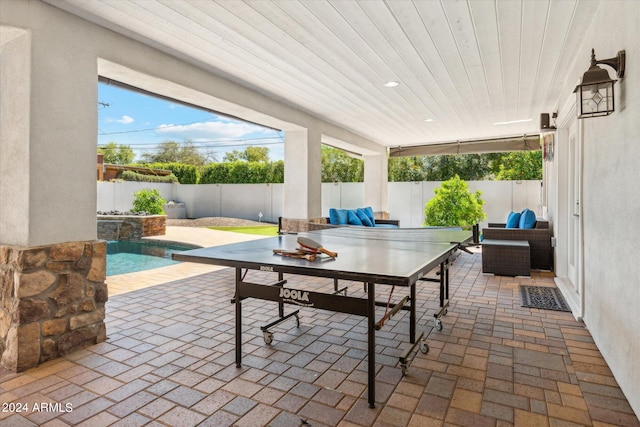 view of patio / terrace with outdoor lounge area and a fenced in pool