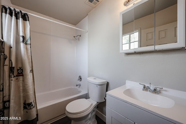 full bathroom with vanity, toilet, and shower / tub combo with curtain