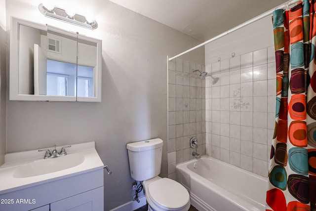 full bathroom with vanity, toilet, and shower / bath combo with shower curtain