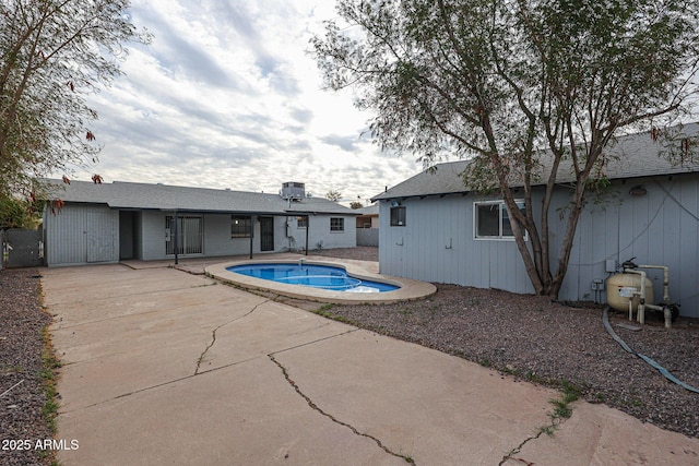 view of swimming pool with a patio