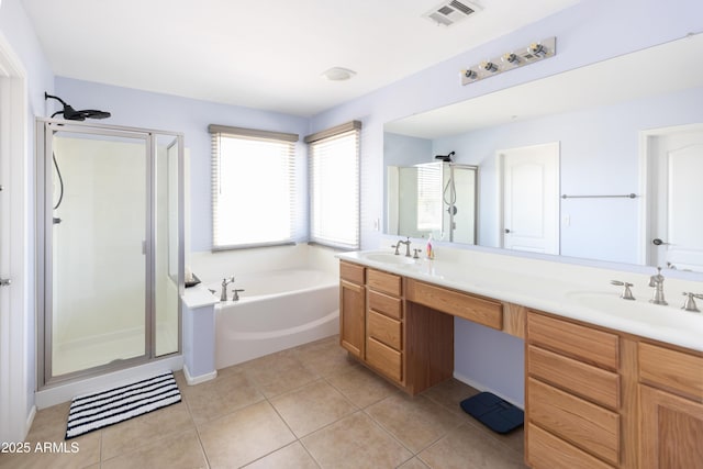 bathroom with vanity, plus walk in shower, and tile patterned flooring