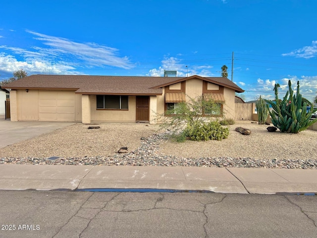 single story home featuring a garage