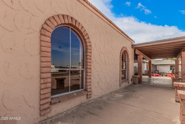 view of home's exterior featuring a patio area