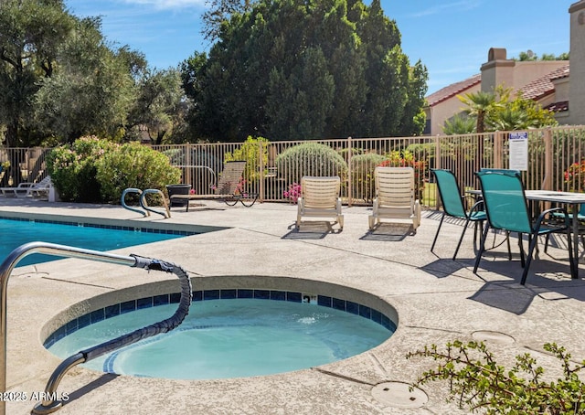 602 N May St Unit 65, Mesa, AZ 85201 - pool with a patio, a hot tub, and fence