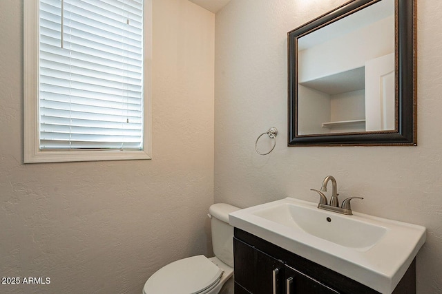 18123 W Lundberg St, Surprise, AZ 85388 - half bathroom featuring vanity and toilet
