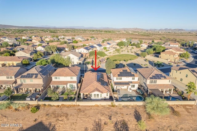 drone / aerial view featuring a mountain view