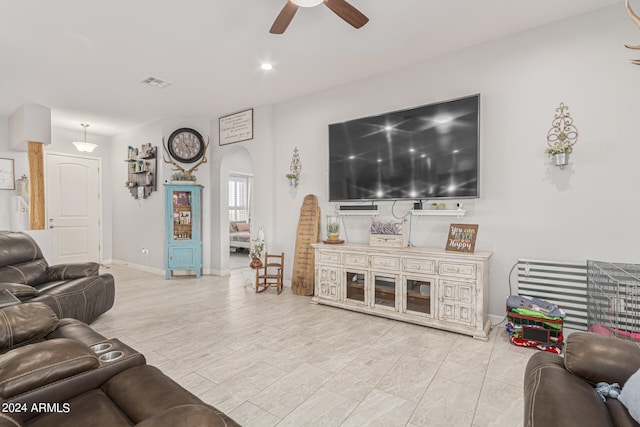 living room featuring ceiling fan