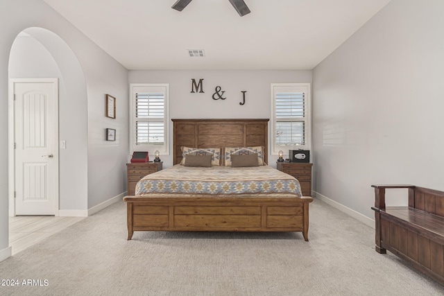 carpeted bedroom featuring ceiling fan