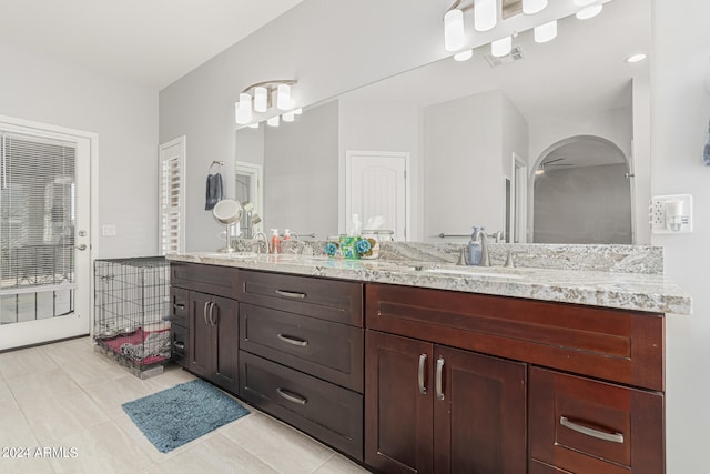 bathroom with vanity, ceiling fan, and tile patterned floors