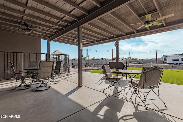 view of patio featuring ceiling fan