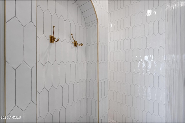 room details with a tile shower