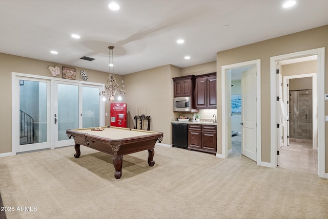 recreation room featuring sink, light colored carpet, and pool table