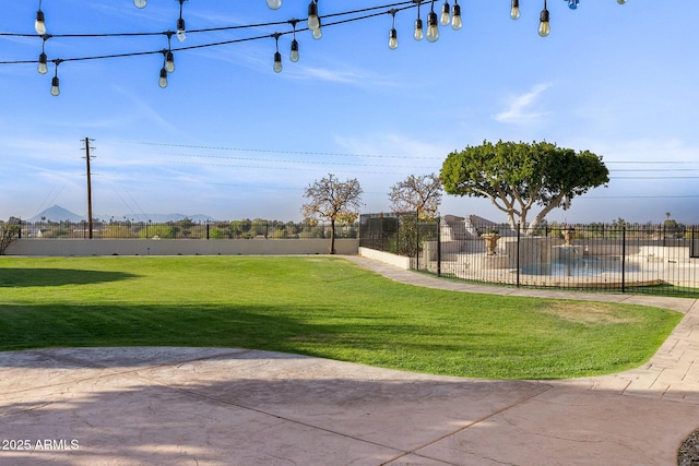 view of home's community with a yard and a swimming pool