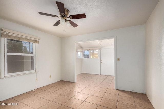 813 N Gilbert Ave, Casa Grande, AZ 85122 - spare room featuring a ceiling fan and light tile patterned flooring