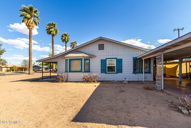 813 N Gilbert Ave, Casa Grande, AZ 85122 - view of front of property with board and batten siding