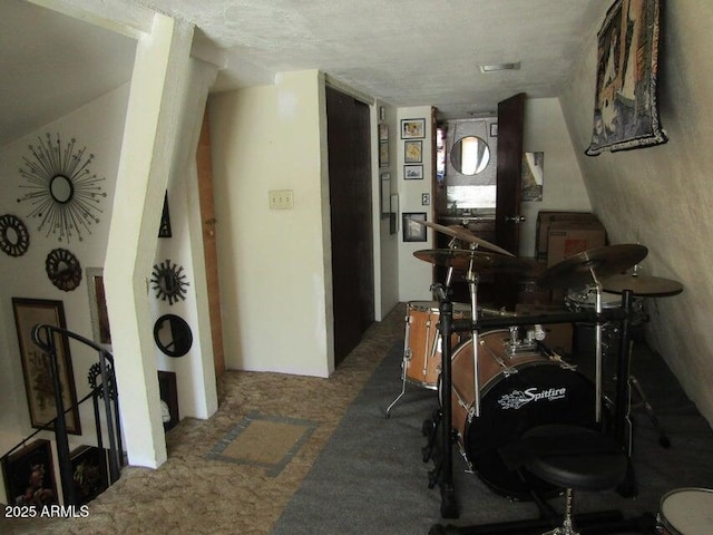 corridor with carpet flooring