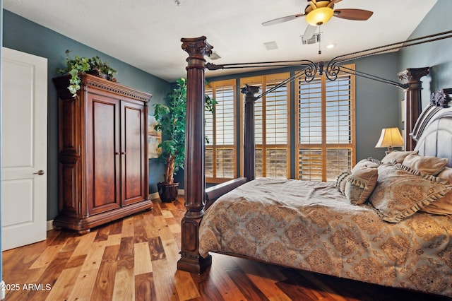 bedroom featuring ceiling fan and light wood-type flooring