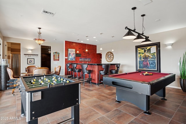 playroom featuring bar and pool table