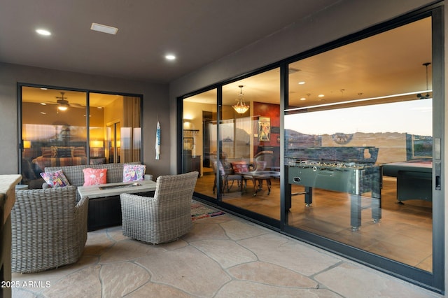 patio terrace at dusk with an outdoor hangout area