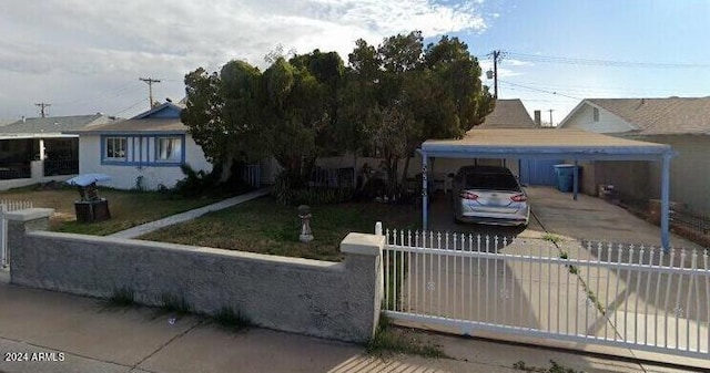 5833 W Rosewood Ln, Phoenix, AZ 85031 - view of front facade with a fenced front yard and a detached carport