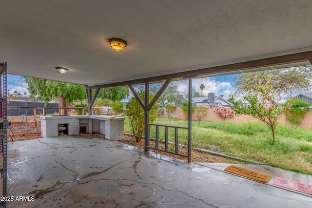 view of patio with a fenced backyard